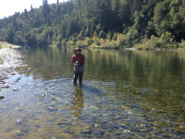 Playing a fish on the Klamath